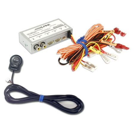 En enhet med kablar, kontakter och en knapp för kamerainterface.