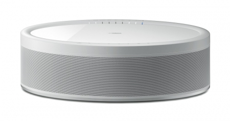 Aktiv wifi-högtalare i vitt med rund form och grå nätfront.