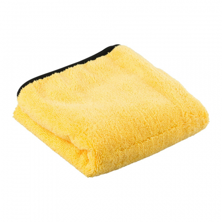 En gul mikrofiberduk som är mjuk och fluffig, perfekt för torkning.
