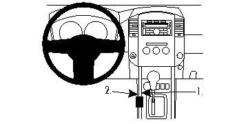 Bild av instrumentbrädan i en Nissan Navara 11-15 med konsol och styrning.
