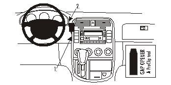 Illustration av instrumentpanel och ratt i Kia Carnival 02-05.