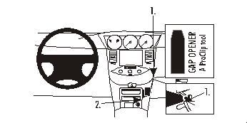 Det visar en bild av bilens interiör med verktyg och instruktioner.