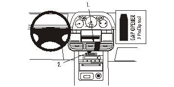 Bilden visar instrumentpanelen och mittkonsolen i en Nissan X-Trail 02-03.