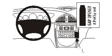Bild som visar bilens instrumentbräda och en gapopener.