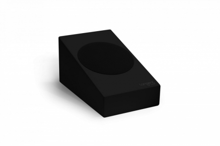 En svart, minimalistisk USB-laddare med en rund yta.