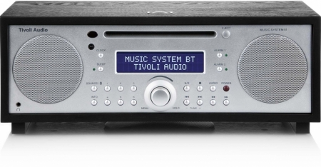 Musiksystem med Bluetooth, display och volymkontroll.