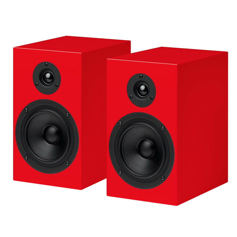 Röda högtalare med svart element och diskant. Stilren design för ljudåtergivning.