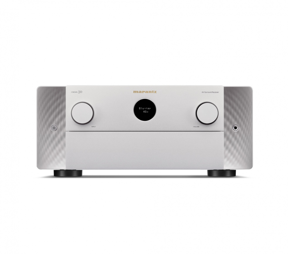 En silverfärgad hemmabioförstärkare med två reglage och en digital display.