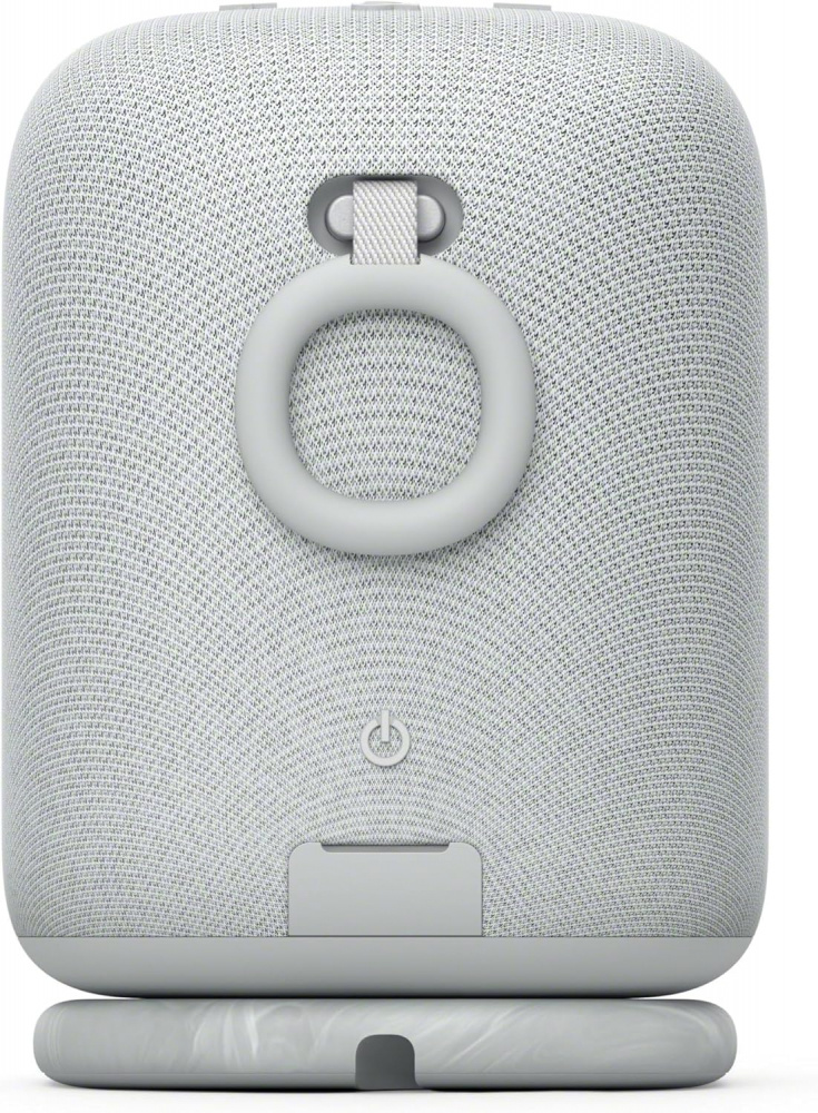 En ljusgrå trådlös bärbar högtalare med rundad design.