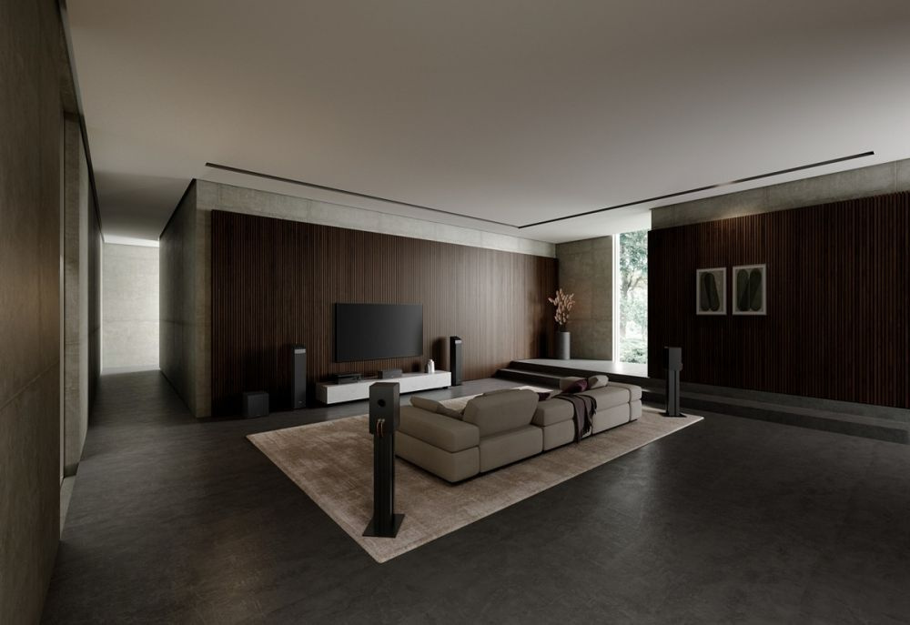 Modernt vardagsrum med TV, soffa och ljudsystem i en stilren miljö.