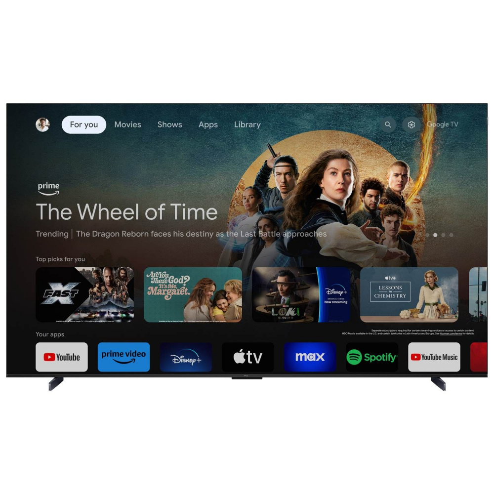 En stor TV-skärm med Google TV-gränssnitt och rekommenderade filmer och appar.
