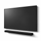 Yamaha True X Bar 40A soundbar med Dolby Atmos, svart En svart ljudlimpa under en svart TV.