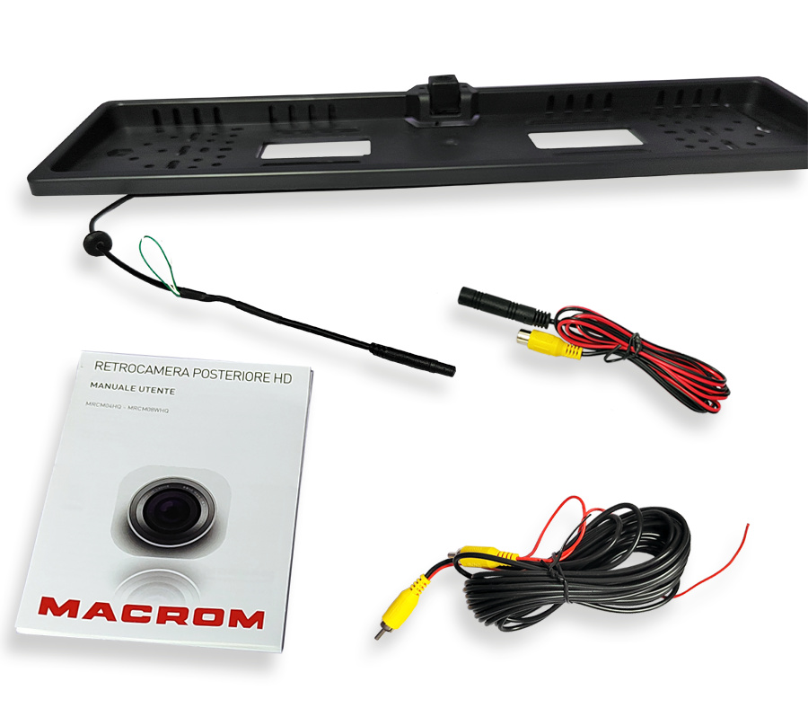 Backkamera, nummerplåtshållare, kablar och manual.