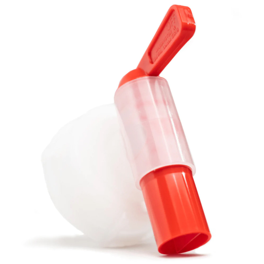 En röd tappkran med transparent del och handtag.