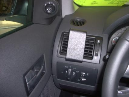 Kontrollpanel och luftutblås i Ford Mondeo 01-07, vänster sida.