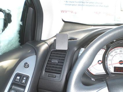 Inredning av Nissan Murano 09-14, med mittkonsol och luftventil synlig.