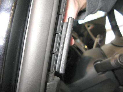 Fäste eller handtag inuti en Opel Astra-dörr, vänster sida.