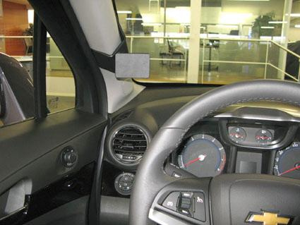 Interiör av Chevrolet Orlando 11-14, med fokus på instrumentpanelen och ratt.