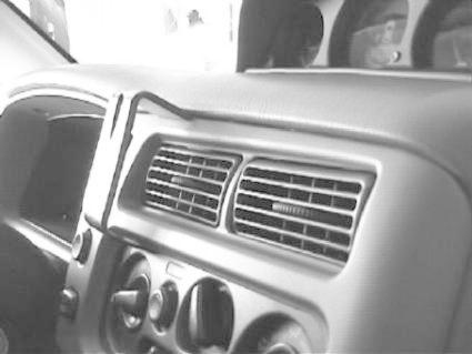 Interiörvy av Mitsubishi Pajero Sport, inklusive luftventiler och instrumentpanel.