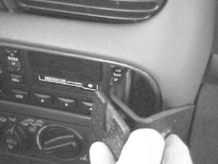 Ett handtag som används för att justera bilens ljudsystem.