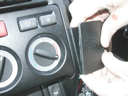 Ett handtag eller del av interiören i en Landrover Freelander.