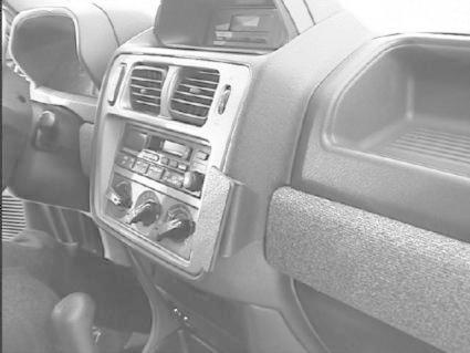 Bilinteriör med instrumentpanel och radio för Mitsubishi Pajero Pinin.