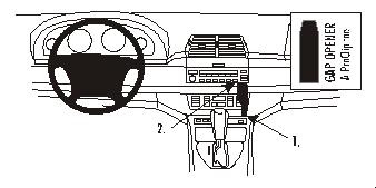 Bild av BMW X5 00-06 interiör med instrumentpanel och växelspak.