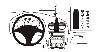 Instrumentbräda med radio och ventiler, verktyg för installation visas.