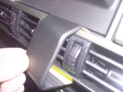 En del av bilens ventilationssystem med regleringsknappar.