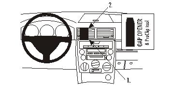 Instrumentbräda med kontroller och en gapöppnare för stereoavlägsnande.
