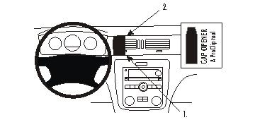 Instrumentbräda med ratt, luftventil och radionoteringar.