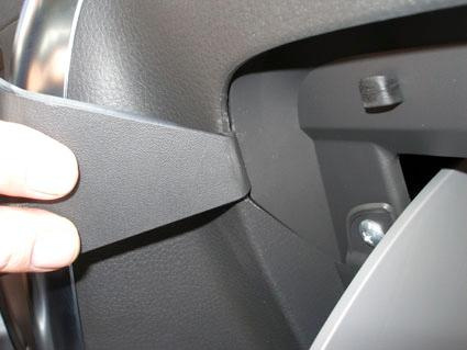 Detalj av inredning med vinklad kant, tydlig passform för Suzuki SX4 och Fiat Sedici.