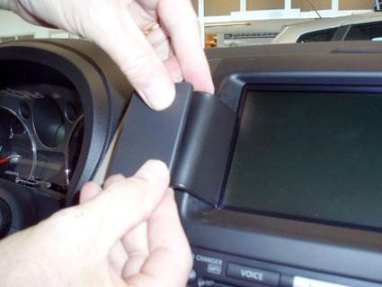 Installera en del av bilens infotainmentsystem.