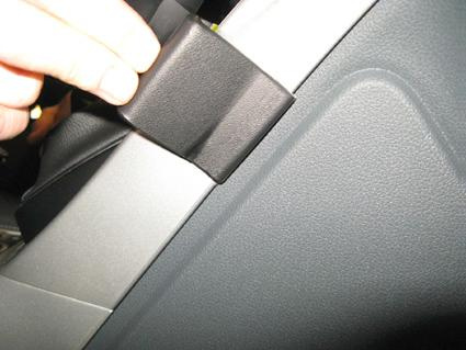 Detalj av interiör, handtag eller del av bilens inredning.