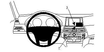 Instrumentbräda med ratt och navigationssystem.