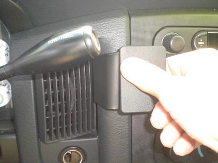 Ett handtag som används för att öppna en lucka i bilen.