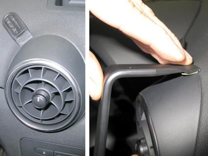 Bild visar en ventilationsöppning och en handsfree-enhet i Audi A1.