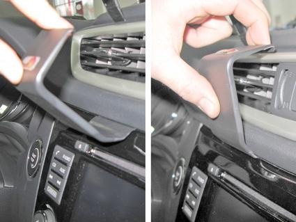 Bild på en hand som justerar luftventilen i en Nissan X-Trail/Qashqai.