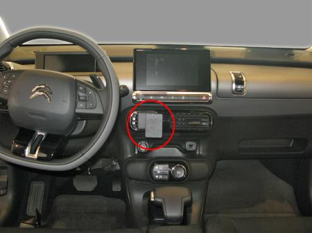 En monteringsbygel för Citroen C4 Cactus, placerad vid bilens mittkonsol.