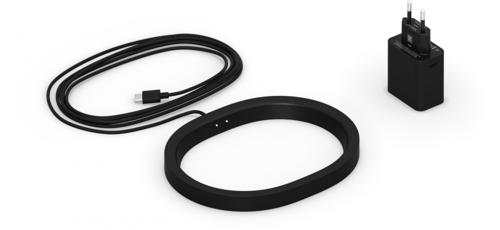 En svart laddningsdocka, kabel och adapter för Sonos Move 2 högtalare.