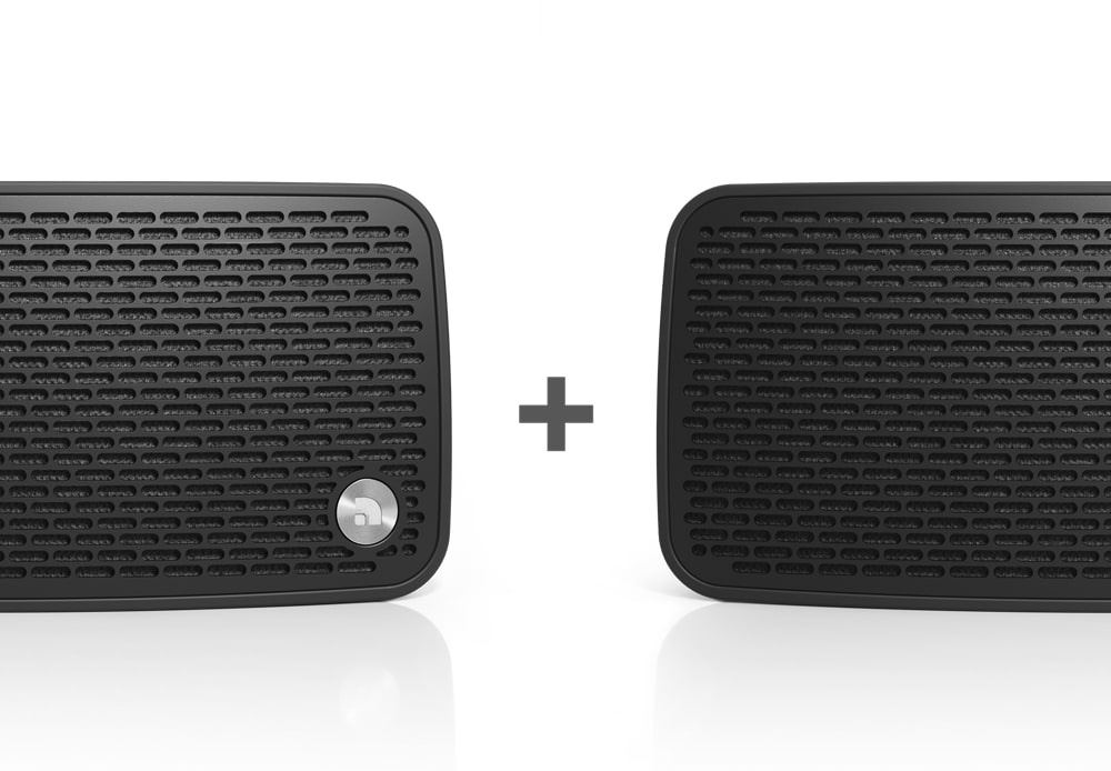 Bärbar Bluetooth-högtalare i svart med ett svart mönstrat galler.