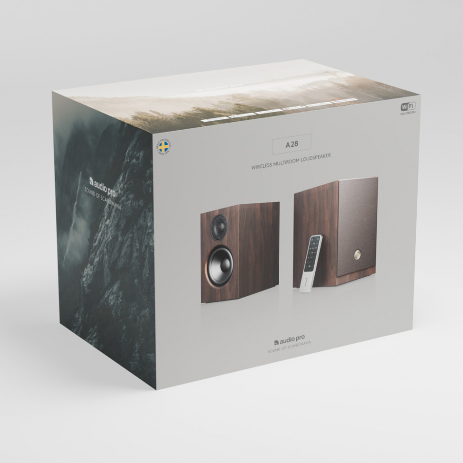 Förpackning av Audio Pro A28 stativhögtalare i valnöt med fjärrkontroll.