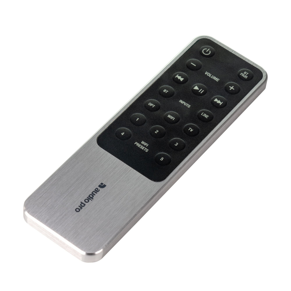 Fjärrkontroll med knappar för volym och funktioner.