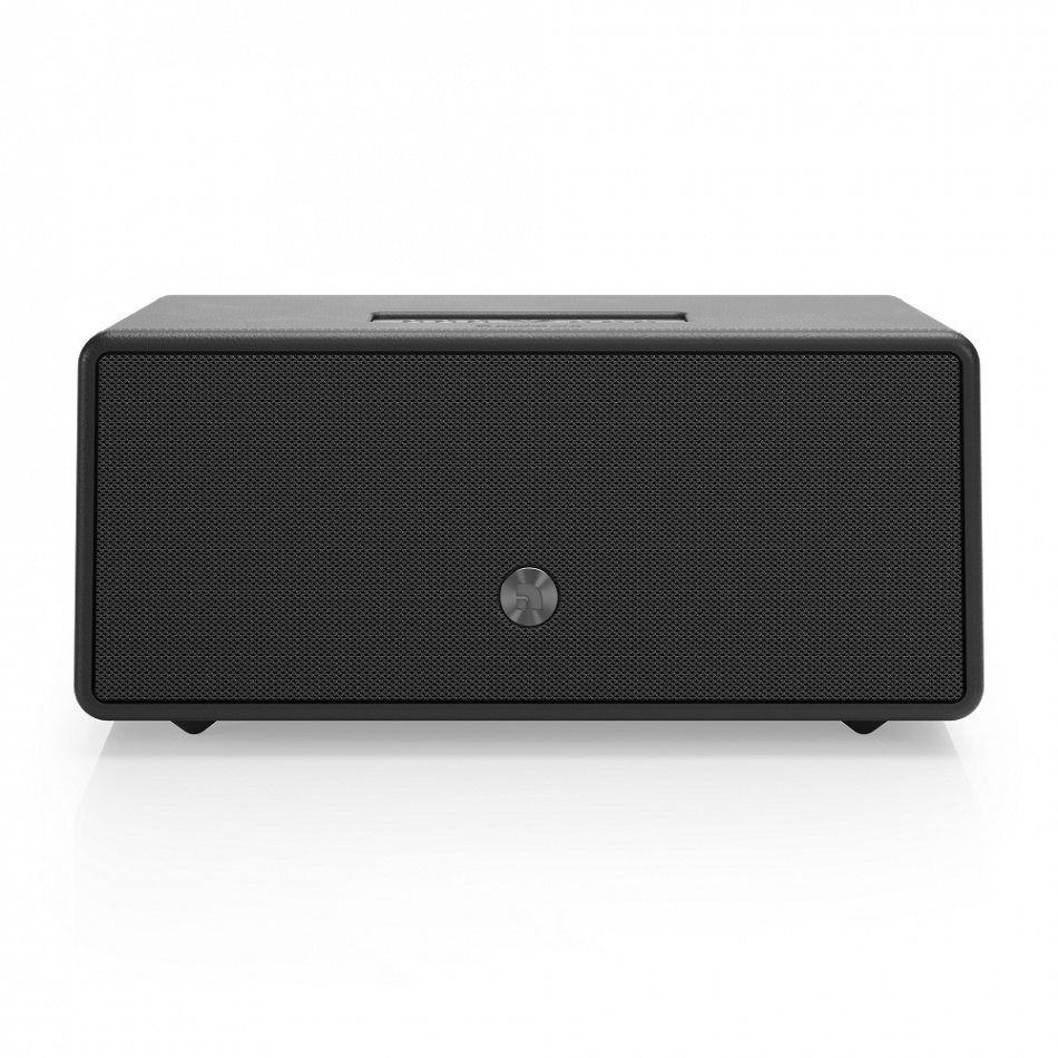 Svart trådlös högtalare med minimalistisk design och nätverksfunktioner.