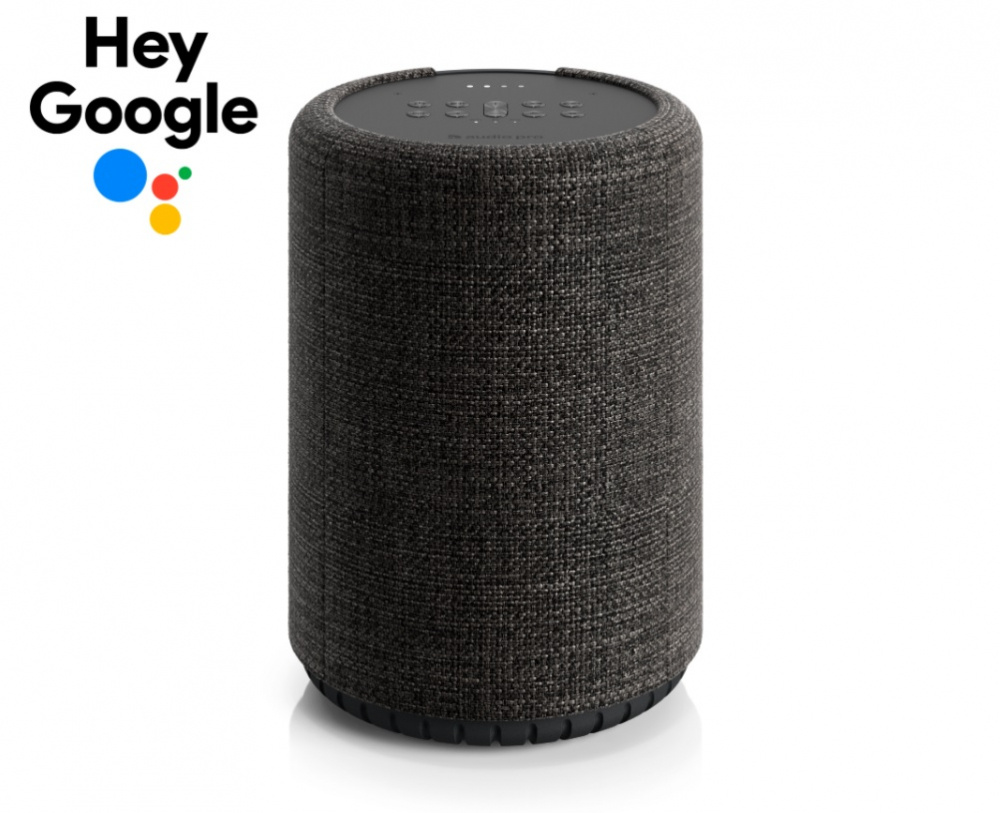 En mörkgrå, cylindrisk smarthögtalare med röststyrning.