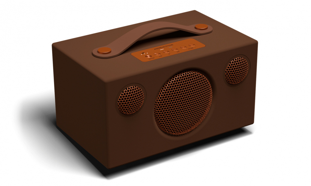 Bluetooth-högtalare med en kompakt design och en unik brun färg.