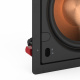 Klipsch PRO-250RPW-LCR vägghögtalare, styck Vägghögtalare med en grön kopparfärgad element och svart ram.