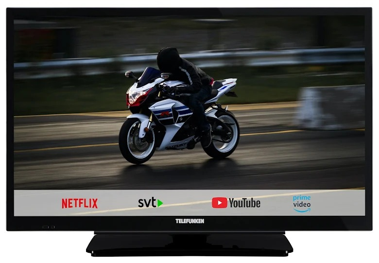 En TV med en motorcykel som körs, appar för streaming visas.