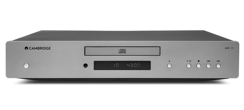 CD-spelare med enkel design, knappar och display för musikhantering.