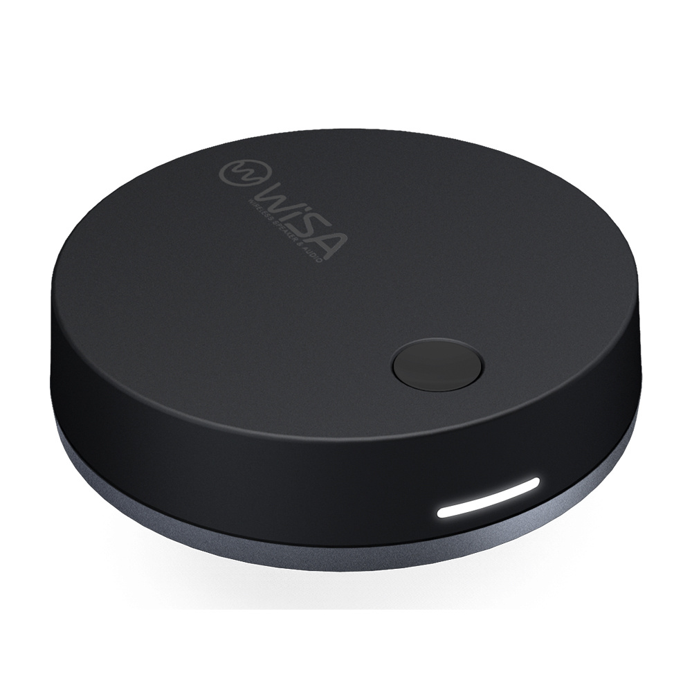 Svart, rund trådlös sändare med ljusindikator och logotyp.